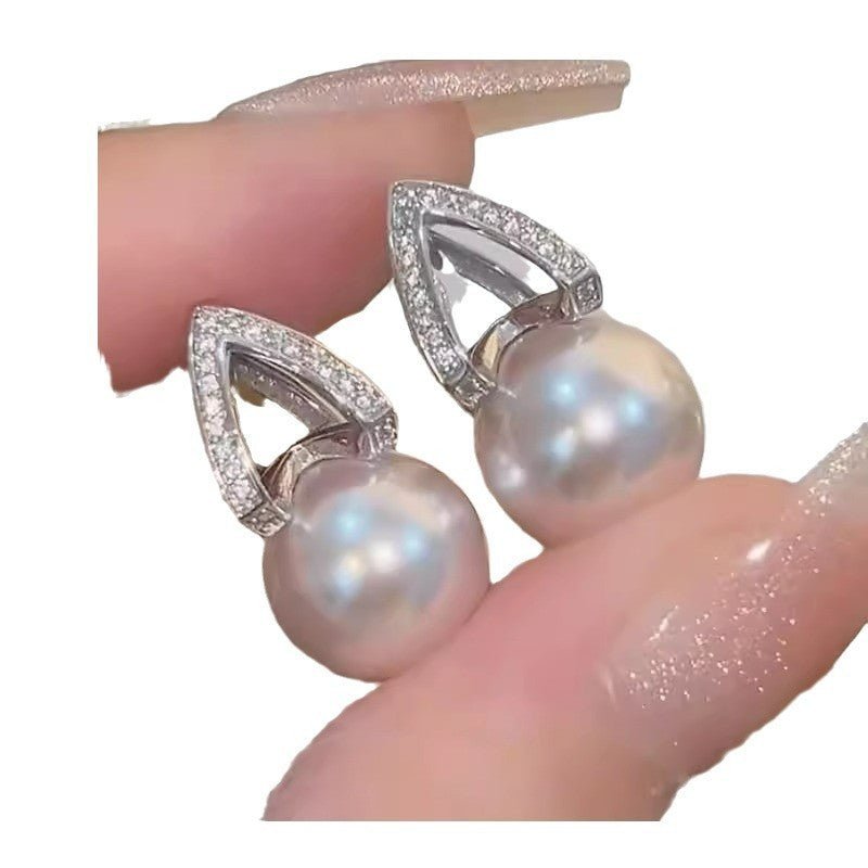Special-interest Design Simple Zircon Pearl Earrings Women's Fashion $18.38 Dana Fashion Color: Zircon Pearl Earrings Women's Accessories Product information: Treatment Process: inlaid zircon Color: zircon pearl earrings Applicable population: Female Mate