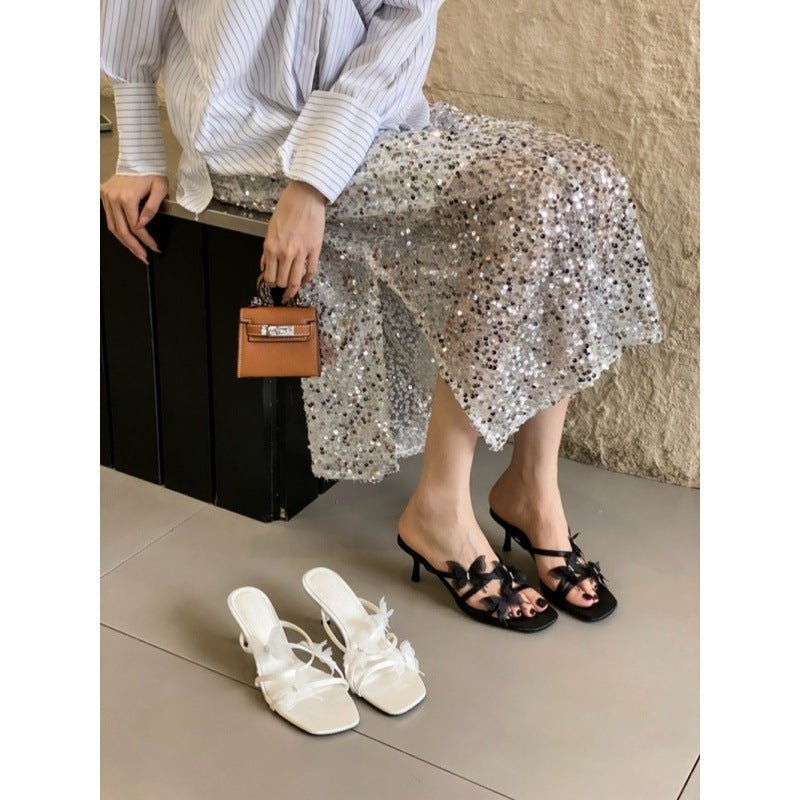 Square Toe High Heel Slippers $85.50 Dana Fashion Color: Black Size: 35 Women's shoes Product information: Lining material: Microfiber Scaffolding shape: square head Color: white, black Shoe Material: Microfiber Size: 35.36, 37.38, 39.40 Shoe Material: ru