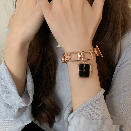 Steel Belt Chain Special-interest Design Square Pendant Dial A Little Retro Watch $74.68 Dana Fashion Color: Gold Strap Gold Noodles Women's Accessories Product information: Color: gold strap white surface, gold strap gold surface, silver striped white su