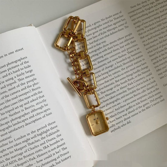 Steel Belt Chain Special-interest Design Square Pendant Dial A Little Retro Watch $74.68 Dana Fashion Color: Gold Strap Gold Noodles Women's Accessories Product information: Color: gold strap white surface, gold strap gold surface, silver striped white su