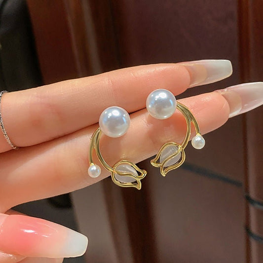 Sterling Silver Needle Tulip Stud Earrings For Women $15.50 Dana Fashion Color: Necklace 4222 Women's Accessories Product information: Treatment Process: Electroplating Color: Sterling Silver Needle-4192, necklace-4222 Material: Alloy Shape: Flower Packin