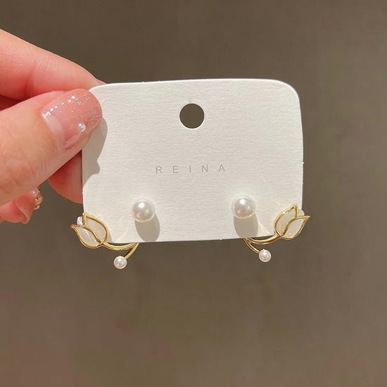 Sterling Silver Needle Tulip Stud Earrings For Women $15.50 Dana Fashion Color: Sterling Silver Needle 4192 Women's Accessories Product information: Treatment Process: Electroplating Color: Sterling Silver Needle-4192, necklace-4222 Material: Alloy Shape: