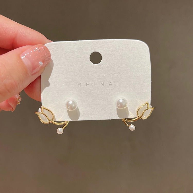 Sterling Silver Needle Tulip Stud Earrings For Women $15.50 Dana Fashion Color: Sterling Silver Needle 4192 Women's Accessories Product information: Treatment Process: Electroplating Color: Sterling Silver Needle-4192, necklace-4222 Material: Alloy Shape: