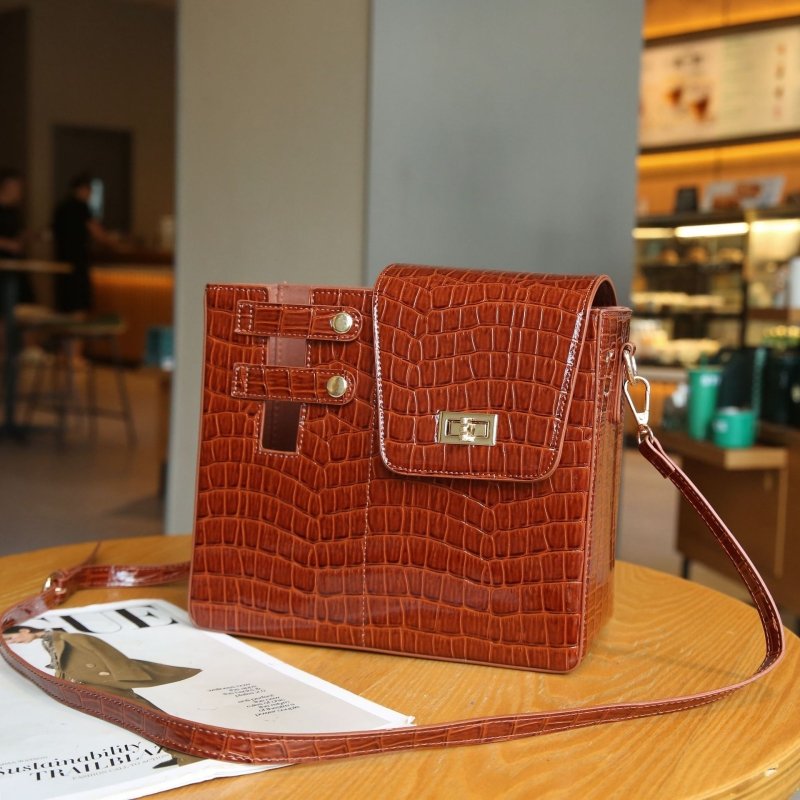 Stone Pattern Special-interest Design Crossbody Bag $59.00 Dana Fashion Color: Black Women's Bags Product information: Color: pink, black, brown Material: PU Suitcase shape: Bucket Bag internal structure: file bag Popular elements: Lock Number of shoulder