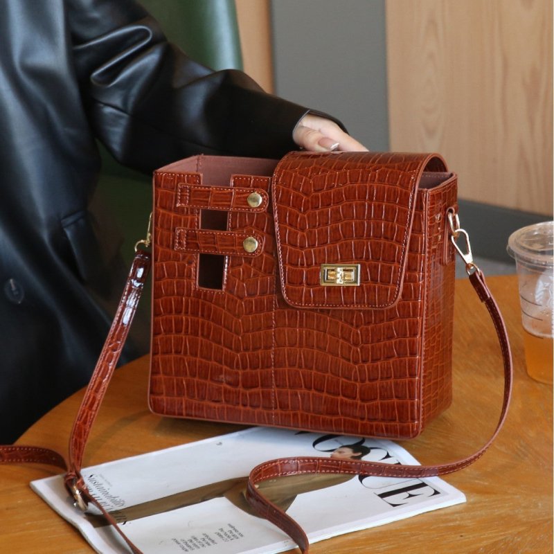 Stone Pattern Special-interest Design Crossbody Bag $59.00 Dana Fashion Color: Black Women's Bags Product information: Color: pink, black, brown Material: PU Suitcase shape: Bucket Bag internal structure: file bag Popular elements: Lock Number of shoulder