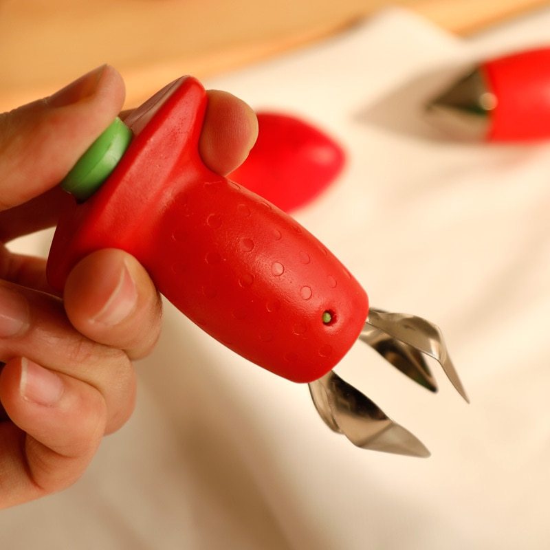 Strawberry Huller Creative Fruit Leaf Remover Kitchen Gadget $10.03 Dana Fashion default: default Dana's Kitchen Overview: 1. Press the button and extend the claw in front of hull strawberries and core other soft fruits and vegetables. 2. Get kids involve
