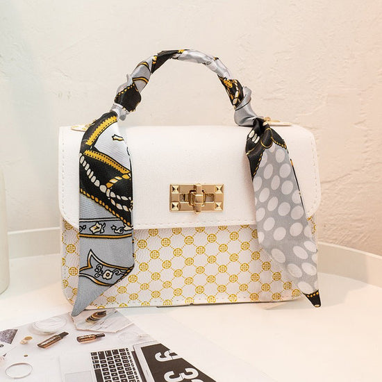 Street Trendy One-shoulder Fashion Printed Silk Scarf Diagonal Bag $19.99 Dana Fashion Color: Black Women's Bags Product information: Lining texture: without lining Color: white, khaki, black, pink Outer bag type: Three-dimensional pocket Hardness: medium