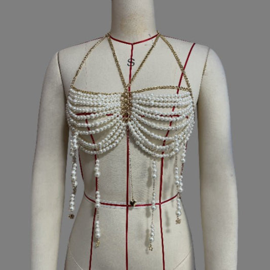 Stringed Pearls Chest Necklace Tassel Halterneck Vest Top Body Chains $39.00 Dana Fashion Color: White Size: Free Size Women's Accessories Product information: Type: pearl beads chest necklace top vest Color: White Style: Women's Material: Alloy Size: fre