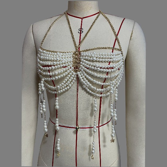 Stringed Pearls Chest Necklace Tassel Halterneck Vest Top Body Chains $39.00 Dana Fashion Color: White Size: Free Size Women's Accessories Product information: Type: pearl beads chest necklace top vest Color: White Style: Women's Material: Alloy Size: fre