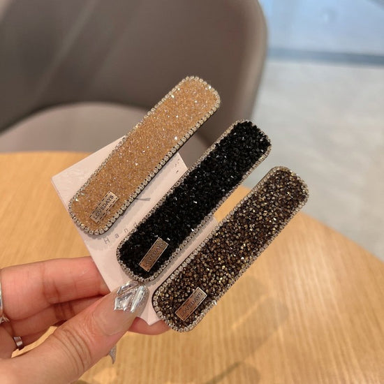 Stylish Graceful Simple Versatile High Sense Barrettes New $10.00 Dana Fashion Color: Apricot Women's Accessories Product information: Processing process: manual Color: black, gold, champagne, silver, apricot, pink Applicable people: women Material: artif
