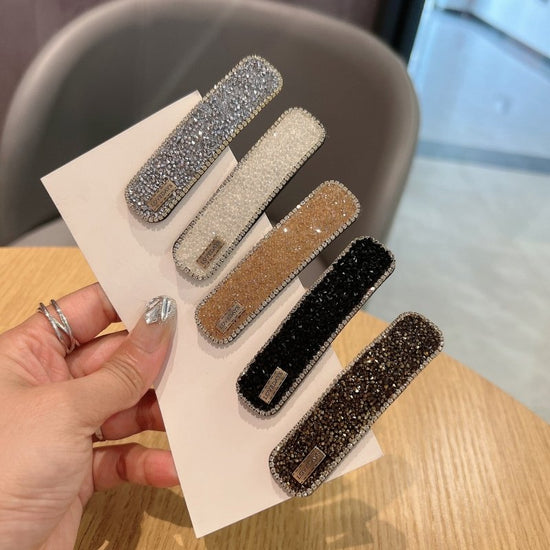 Stylish Graceful Simple Versatile High Sense Barrettes New $10.00 Dana Fashion Color: Apricot Women's Accessories Product information: Processing process: manual Color: black, gold, champagne, silver, apricot, pink Applicable people: women Material: artif