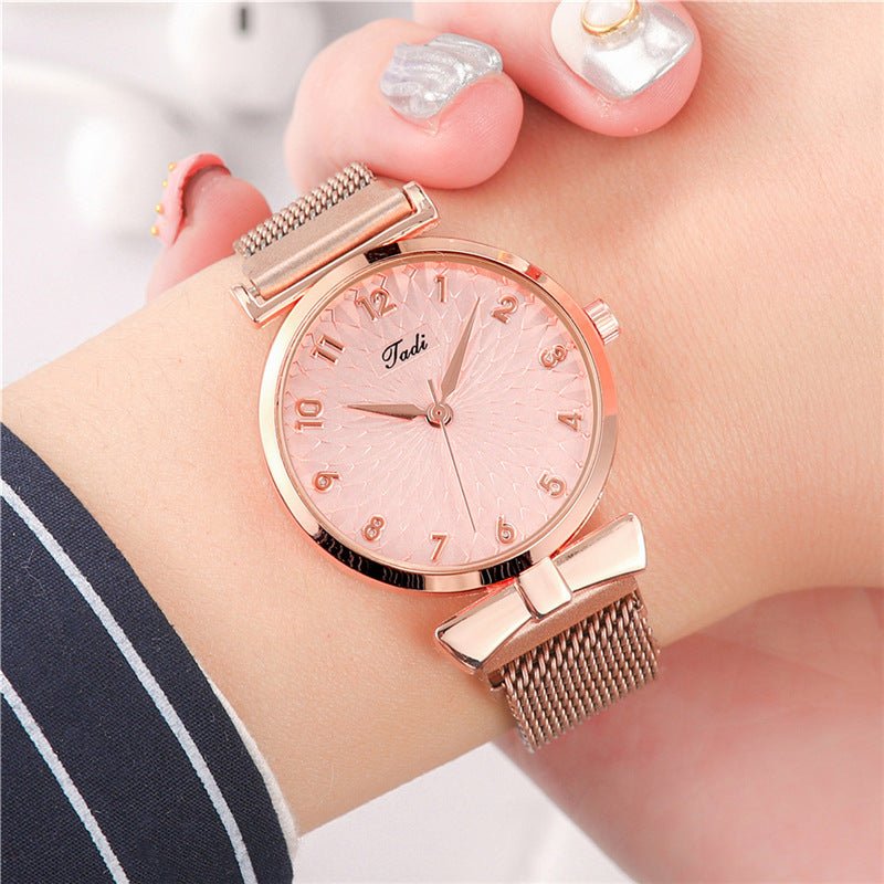 Suit Women's Quartz Watch With Bracelet $15.00 Dana Fashion Color: Rose Pink Gold Bracelet Women's Accessories Product information: Color: Rose pink gold bracelet Thickness: 8mm Dial diameter: 26mm Crown type: Spiral crown Mirror material: mineral reinfor