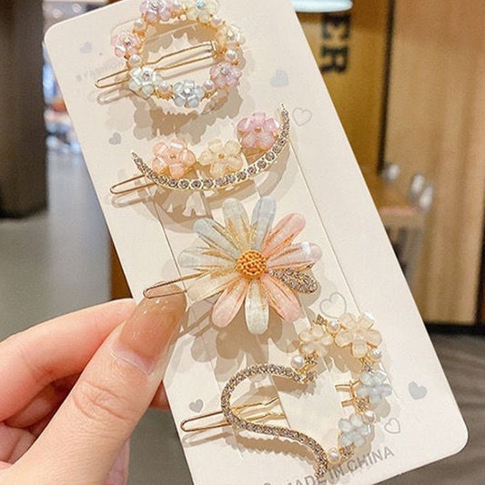 Summer Alloy Handmade Temperament Petals Barrettes $20.00 Dana Fashion Color: 4Piece set of card buckles Women's Accessories Product information: Processing process: manual Color: 1# flower style, 2# garland style, 3# Crescent style, 4# love style Applica