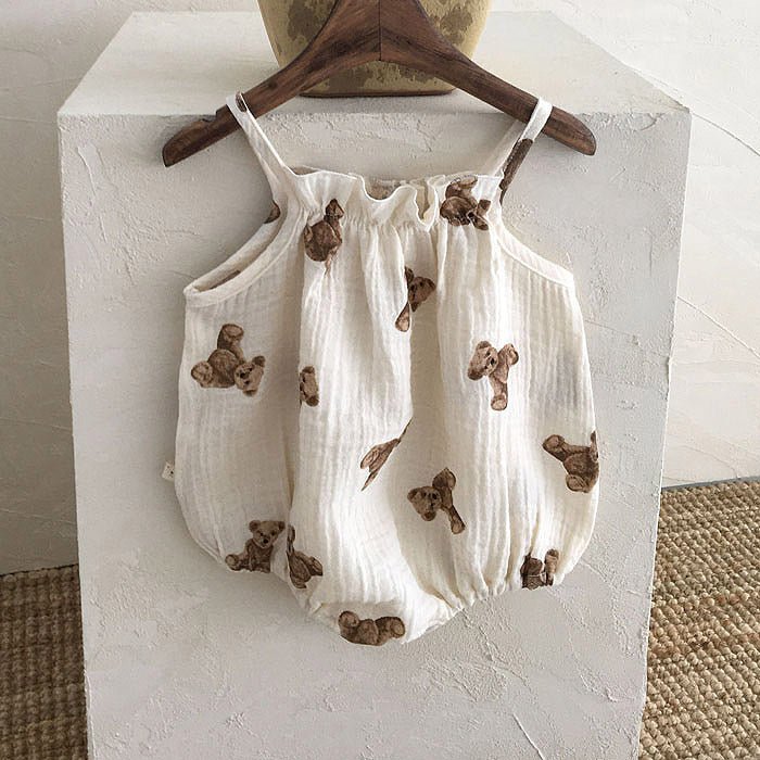 Summer Sling Jumpsuit For Boys And Girls $32.71 Dana Fashion style: Offwhite romper Size: 66cm Baby Clothing Product information： Sleeve: Sleeveless Hooded or not: removable with cap Thickness: Thin section Main fabric composition: cotton Main fabric ingr