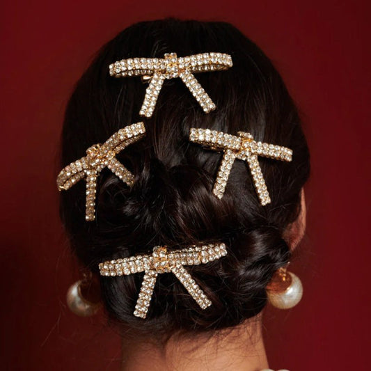 Super Fairy Bow Women's Rhinestone Barrettes $13.13 Dana Fashion Color: Gold Women's Accessories Product information: Treatment Process: Electroplating Color: gold, silver Applicable population: Female Material: Rhinestone Popular elements: Bow Packing li