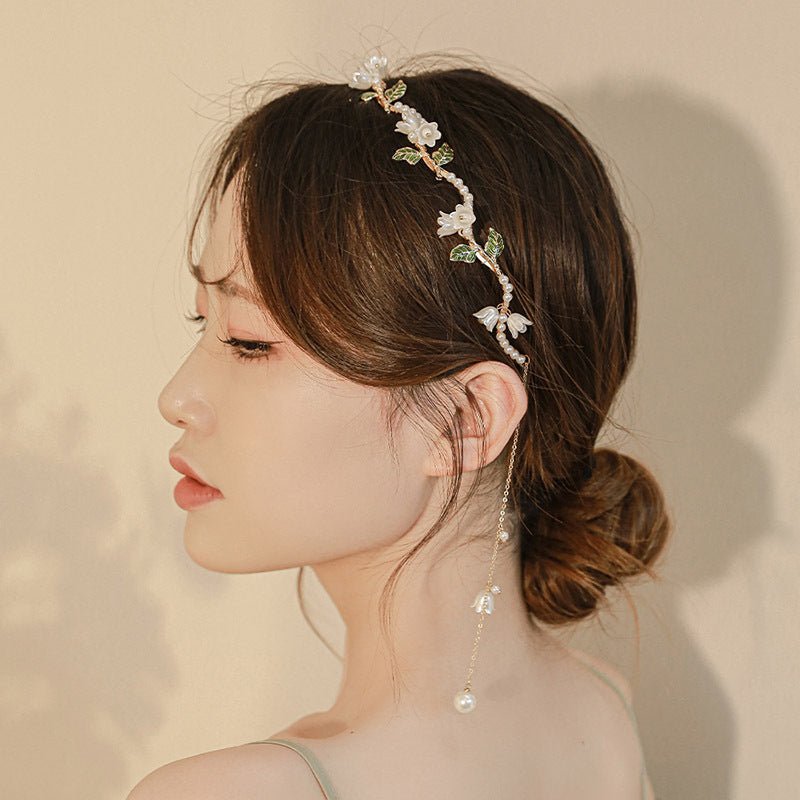 Super Fairy White Linglan Pearl Tassel Mori Temperament Elegant Headband $20.79 Dana Fashion Color: FS1160 Women's Accessories Product information: Process: Electroplating Applicable people: women Material: Alloy Popular elements: Lily Style: Cute Packing