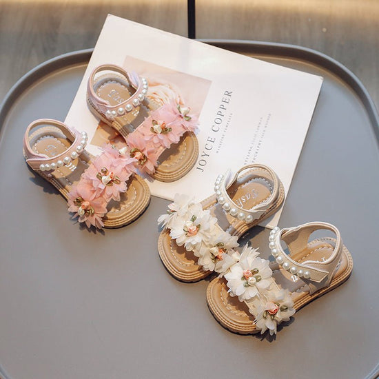 Sweet Flowers Kids Sandals Girls Versatile Soft Toddler Shoes $38.01 Dana Fashion Color: Off white Shoe size: Size23 Baby & Mother Overview: Unique design, stylish and beautiful. Good material, comfortable feet. A variety of colors, any choice. Specificat