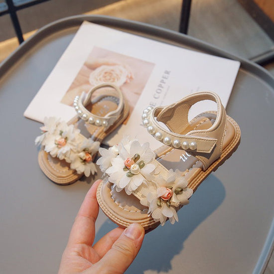 Sweet Flowers Kids Sandals Girls Versatile Soft Toddler Shoes $38.01 Dana Fashion Color: Off white Shoe size: Size23 Baby & Mother Overview: Unique design, stylish and beautiful. Good material, comfortable feet. A variety of colors, any choice. Specificat