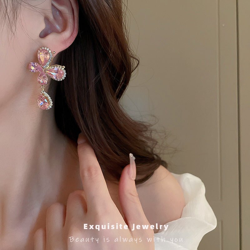 Sweet Light Luxury Rhinestone Zircon Butterfly Water Drop Silver Pin Earrings $14.50 Dana Fashion Color: Silver Needle Pink Women's Accessories Product information: Treatment Process: Diamond Color: Silver Needle pink butterfly water drop earrings Applica