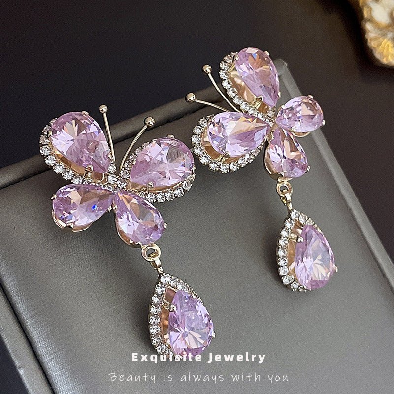 Sweet Light Luxury Rhinestone Zircon Butterfly Water Drop Silver Pin Earrings $14.50 Dana Fashion Color: Silver Needle Pink Women's Accessories Product information: Treatment Process: Diamond Color: Silver Needle pink butterfly water drop earrings Applica