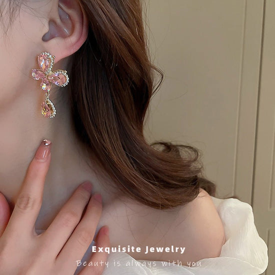 Sweet Light Luxury Rhinestone Zircon Butterfly Water Drop Silver Pin Earrings $14.50 Dana Fashion Color: Silver Needle Pink Women's Accessories Product information: Treatment Process: Diamond Color: Silver Needle pink butterfly water drop earrings Applica