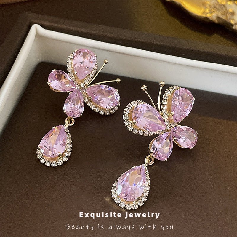 Sweet Light Luxury Rhinestone Zircon Butterfly Water Drop Silver Pin Earrings $14.50 Dana Fashion Color: Silver Needle Pink Women's Accessories Product information: Treatment Process: Diamond Color: Silver Needle pink butterfly water drop earrings Applica
