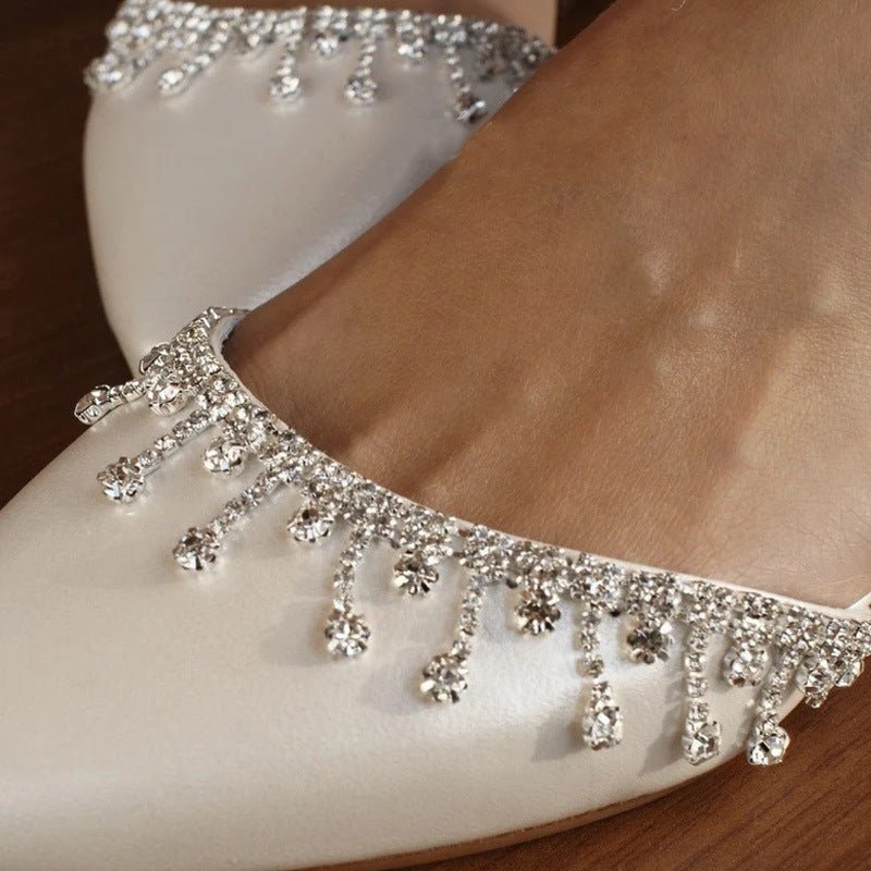 Tassel Rhinestone Decorative White Flat Shoes $79.75 Dana Fashion Color: Ivory White Size: 34 Women's shoes Product information: Lining material: Microfiber Color: Ivory White Upper height: low top Heel height: low heel (1-3CM) Heel shape: flat heel Size: