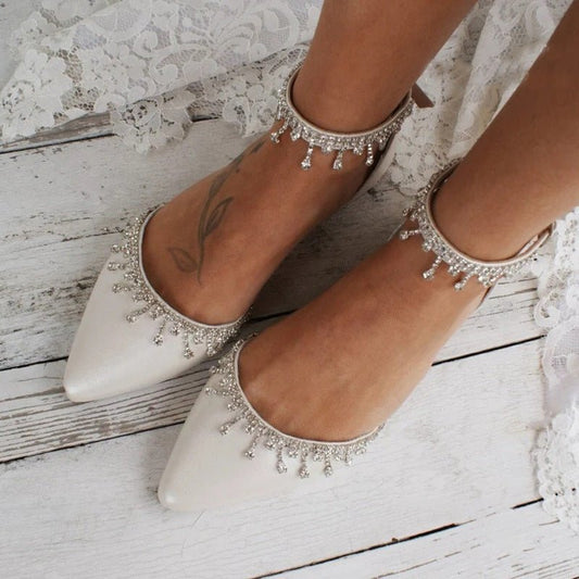 Tassel Rhinestone Decorative White Flat Shoes $79.75 Dana Fashion Color: Ivory White Size: 34 Women's shoes Product information: Lining material: Microfiber Color: Ivory White Upper height: low top Heel height: low heel (1-3CM) Heel shape: flat heel Size: