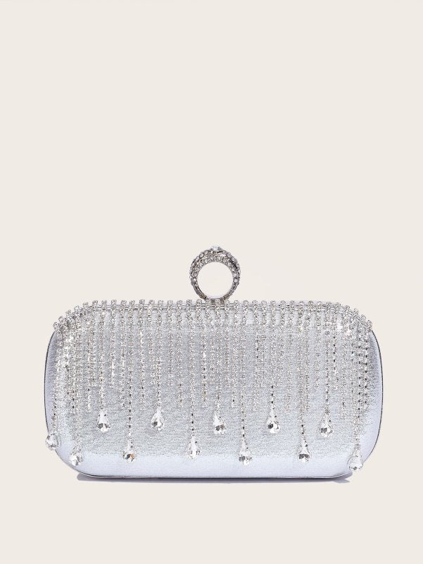 Tassle Diamond Handbag Ladies Wedding Party Portable Chain $54.89 Dana Fashion Color: Silver Size: 19x9.5x4CM Women's Bags Product information: Lined text: Polyester Applicable scenarios: Daily match Color: silver, black, gold Outer bag type: Three-dimens