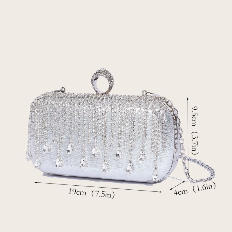 Tassle Diamond Handbag Ladies Wedding Party Portable Chain $54.89 Dana Fashion Color: Black Size: 19x9.5x4CM Women's Bags Product information: Lined text: Polyester Applicable scenarios: Daily match Color: silver, black, gold Outer bag type: Three-dimensi