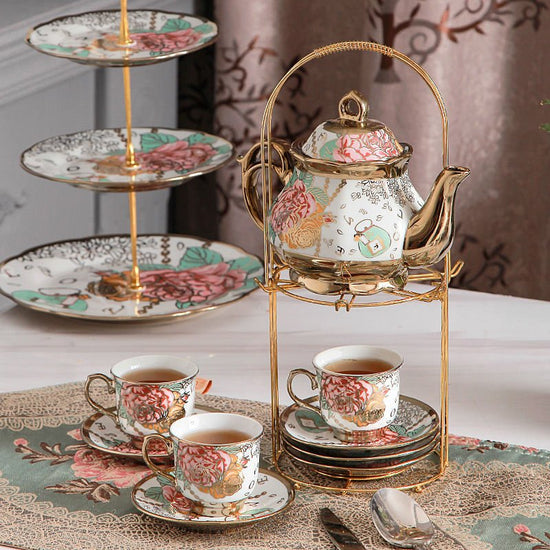 Tea Set Afternoon Tea Coffee Dessert Tableware 15 Pieces $189.00 Dana Fashion style: A Dana's Kitchen Product information: Whether with a tea tray: No Tea ceremony accessories: none Color: (1 pot, 6 cups, 6 saucers, 6 scoops + shelf) Whether the cross-bor