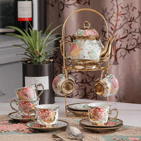 Tea Set Afternoon Tea Coffee Dessert Tableware 15 Pieces $189.00 Dana Fashion style: A Dana's Kitchen Product information: Whether with a tea tray: No Tea ceremony accessories: none Color: (1 pot, 6 cups, 6 saucers, 6 scoops + shelf) Whether the cross-bor