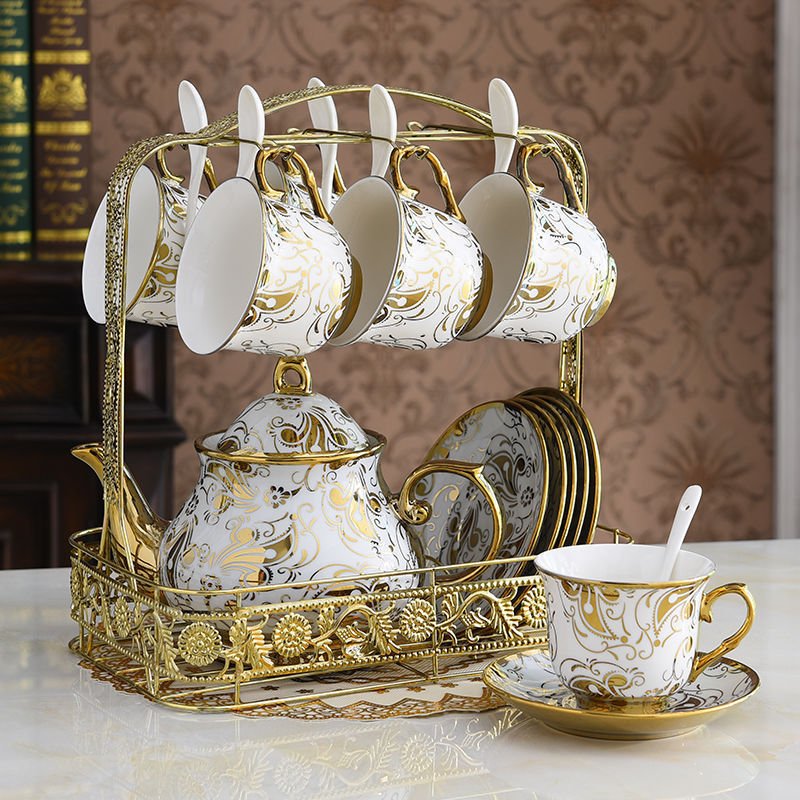 Tea Set Afternoon Tea Coffee Dessert Tableware 15 Pieces $189.00 Dana Fashion style: D Dana's Kitchen Product information: Whether with a tea tray: No Tea ceremony accessories: none Color: (1 pot, 6 cups, 6 saucers, 6 scoops + shelf) Whether the cross-bor
