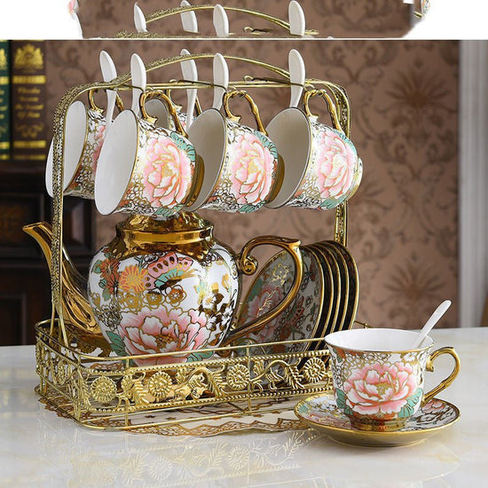 Tea Set Afternoon Tea Coffee Dessert Tableware 15 Pieces $189.00 Dana Fashion style: B Dana's Kitchen Product information: Whether with a tea tray: No Tea ceremony accessories: none Color: (1 pot, 6 cups, 6 saucers, 6 scoops + shelf) Whether the cross-bor