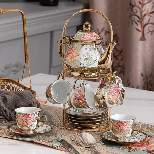 Tea Set Afternoon Tea Coffee Dessert Tableware 15 Pieces $189.00 Dana Fashion style: A Dana's Kitchen Product information: Whether with a tea tray: No Tea ceremony accessories: none Color: (1 pot, 6 cups, 6 saucers, 6 scoops + shelf) Whether the cross-bor