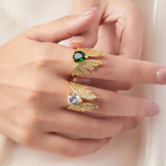 Temperament Elegant Copper Inlaid Zircon Ring $29.00 Dana Fashion Color: A867 Gold Lvzuan Ring Women's Accessories Product information: Type: Ring Treatment Process: Electroplating Color: A867-gold white diamond ring, A867-gold lvzuan ring Applicable peop