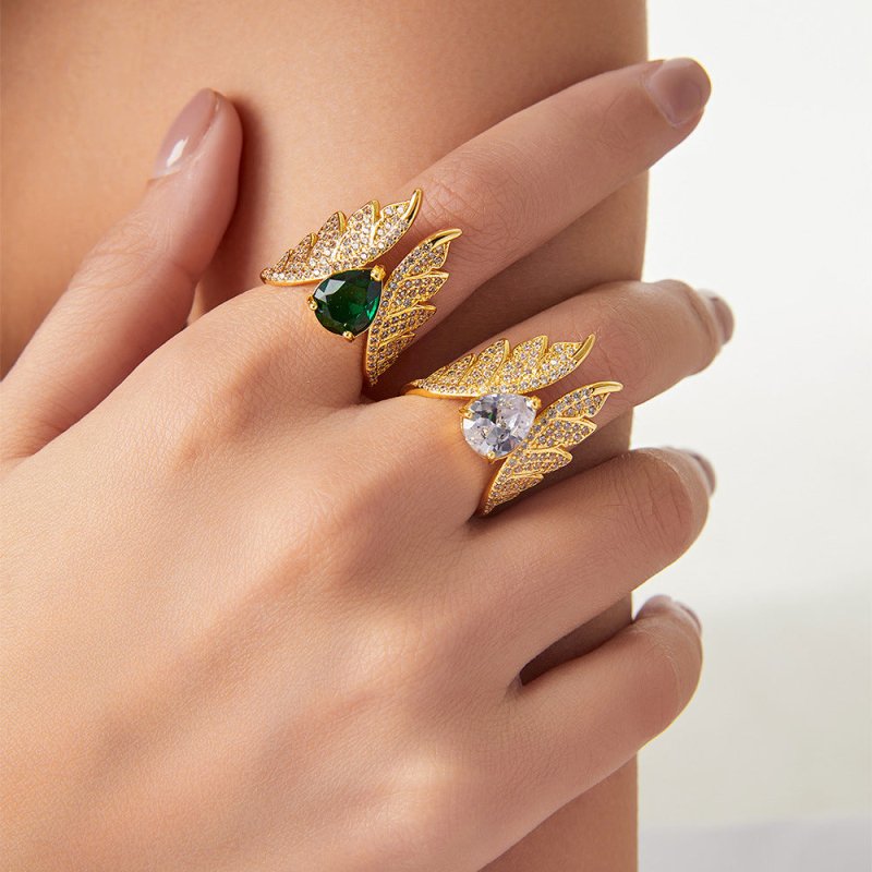 Temperament Elegant Copper Inlaid Zircon Ring $29.00 Dana Fashion Color: A867 Gold Lvzuan Ring Women's Accessories Product information: Type: Ring Treatment Process: Electroplating Color: A867-gold white diamond ring, A867-gold lvzuan ring Applicable peop