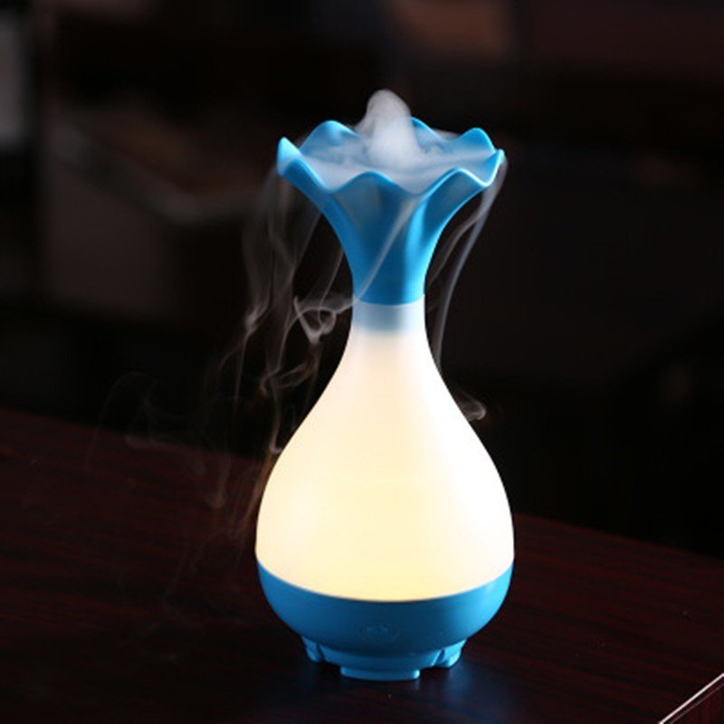 The Jade Clean Bottle Aromatherapy Humidifier $36.87 Dana Fashion Color: Bule Beauty Tools Material: ABS+PP+ electronic components Size: 9.8 * 9.8 * 9.8 CM Applicable area: 10-13m2 Tank capacity: 95 ml Power supply: USB5V, 800 ma, 4 w Number of leds: 6 Wi