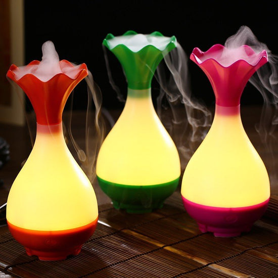 The Jade Clean Bottle Aromatherapy Humidifier $36.87 Dana Fashion Color: Bule Beauty Tools Material: ABS+PP+ electronic components Size: 9.8 * 9.8 * 9.8 CM Applicable area: 10-13m2 Tank capacity: 95 ml Power supply: USB5V, 800 ma, 4 w Number of leds: 6 Wi