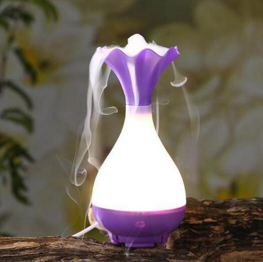 The Jade Clean Bottle Aromatherapy Humidifier $36.87 Dana Fashion Color: Bule Beauty Tools Material: ABS+PP+ electronic components Size: 9.8 * 9.8 * 9.8 CM Applicable area: 10-13m2 Tank capacity: 95 ml Power supply: USB5V, 800 ma, 4 w Number of leds: 6 Wi
