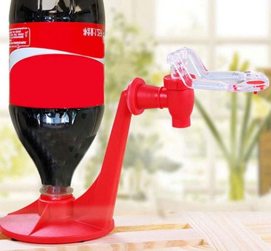 The Magic Tap Soda Dispenser $15.09 Dana Fashion Color: red Dana's Kitchen Overview: Have you ever wanted to have your very own soda machine at home? Well, now you can turn any 2-liter bottle into a soda dispenser! Just twist the Magic Tap Dispenser on to