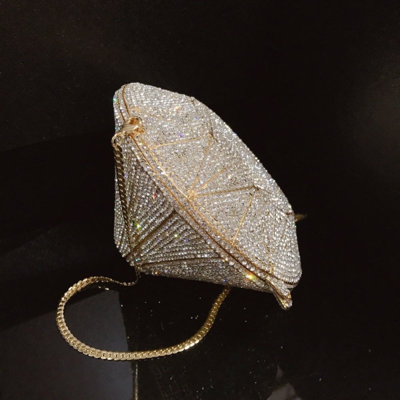 Three-dimensional diamond shape handbags $159.00 Dana Fashion Color: Gold Women's Bags Three dimensional diamond crystal Dinner Bag Gemstone cutting surface, geometric line is clear Each crystal diamond is inlaid by hand, which is fashionable and bright E