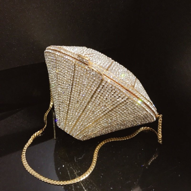 Three-dimensional diamond shape handbags $159.00 Dana Fashion Color: Gold Women's Bags Three dimensional diamond crystal Dinner Bag Gemstone cutting surface, geometric line is clear Each crystal diamond is inlaid by hand, which is fashionable and bright E