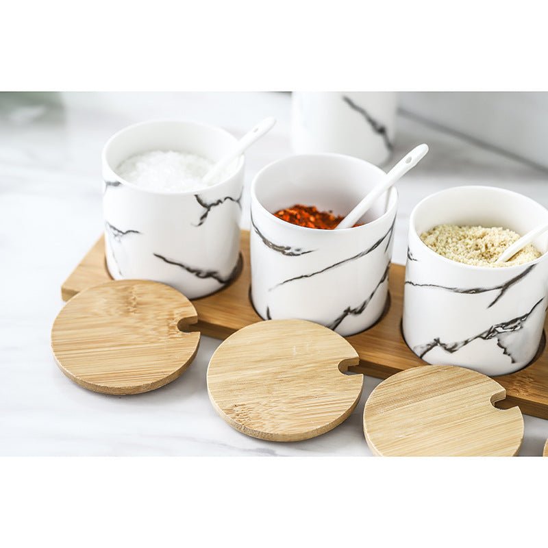 Three-Piece Ceramic Seasoning Jar With Lid $38.88 Dana Fashion style: Cat Size: 3pcs Dana's Kitchen Product information: Material: Ceramic Type of seasoning that can be loaded: solid seasoning Specifications: set of three small pots of marble, set of thre