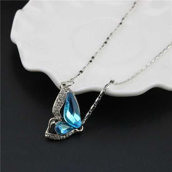 Three-piece necklace set $27.00 Dana Fashion Color: Blue Women's Accessories Style: Europe and America Material: Alloy Treatment process: diamond Style; women's style Set combination: earrings + accessories + jewelry Pendant material: alloy Pattern ;/spid