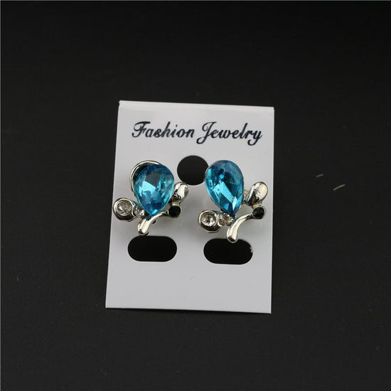Three-piece necklace set $27.00 Dana Fashion Color: Blue Women's Accessories Style: Europe and America Material: Alloy Treatment process: diamond Style; women's style Set combination: earrings + accessories + jewelry Pendant material: alloy Pattern ;/spid