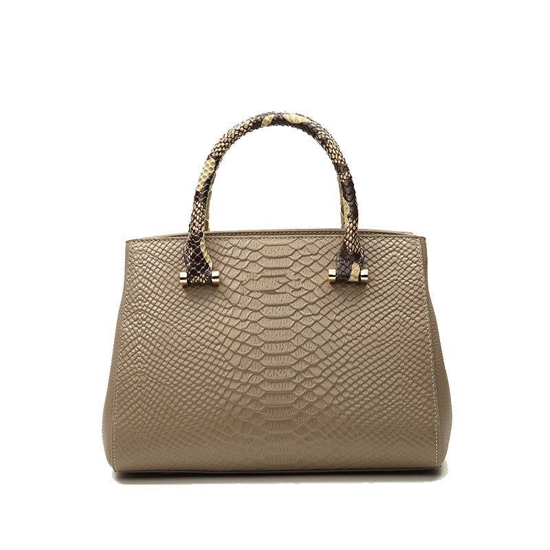 Top Layer Cowhide Leather Ladies Hand Bag $145.00 Dana Fashion Color: Milk Tea Color Women's Bags Product information: Lining texture: Polyester Color: Black, milk tea Leather features: first layer cowhide Hardness: soft Material: genuine leather Suitcase