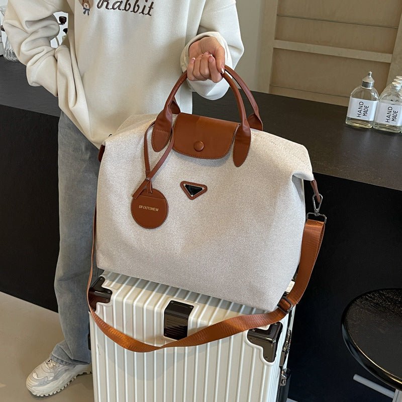 Travel Bag Large Capacity High Sense Lightweight Duffel Bag Travel $58.04 Dana Fashion Color: Black Women's Bags Product information: Lining texture: Polyester Pattern: solid color Applicable scenario: leisure travel Color: brown, black Applicable Gender: