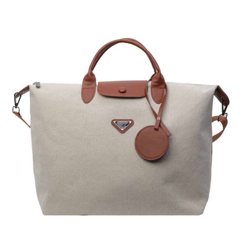 Travel Bag Large Capacity High Sense Lightweight Duffel Bag Travel $58.04 Dana Fashion Color: Brown Women's Bags Product information: Lining texture: Polyester Pattern: solid color Applicable scenario: leisure travel Color: brown, black Applicable Gender: