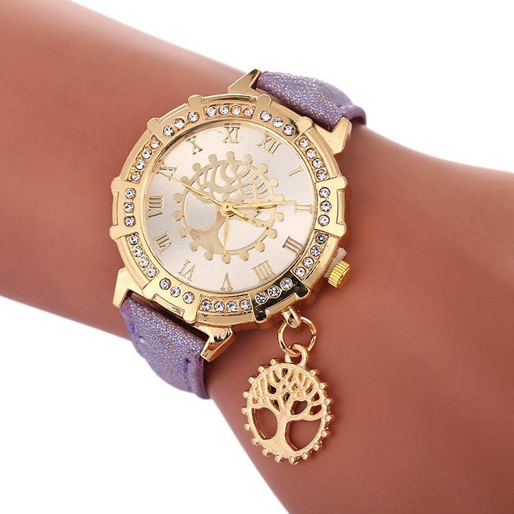 Tree Of Life Pattern Fashion Women's Watches $12.84 Dana Fashion Color: Purple Women's Accessories Product information: Color: white, red, purple, black, gold, sky blue, Lake Blue Thickness: 10mm Packing specification: OPP Applicable people: general Style